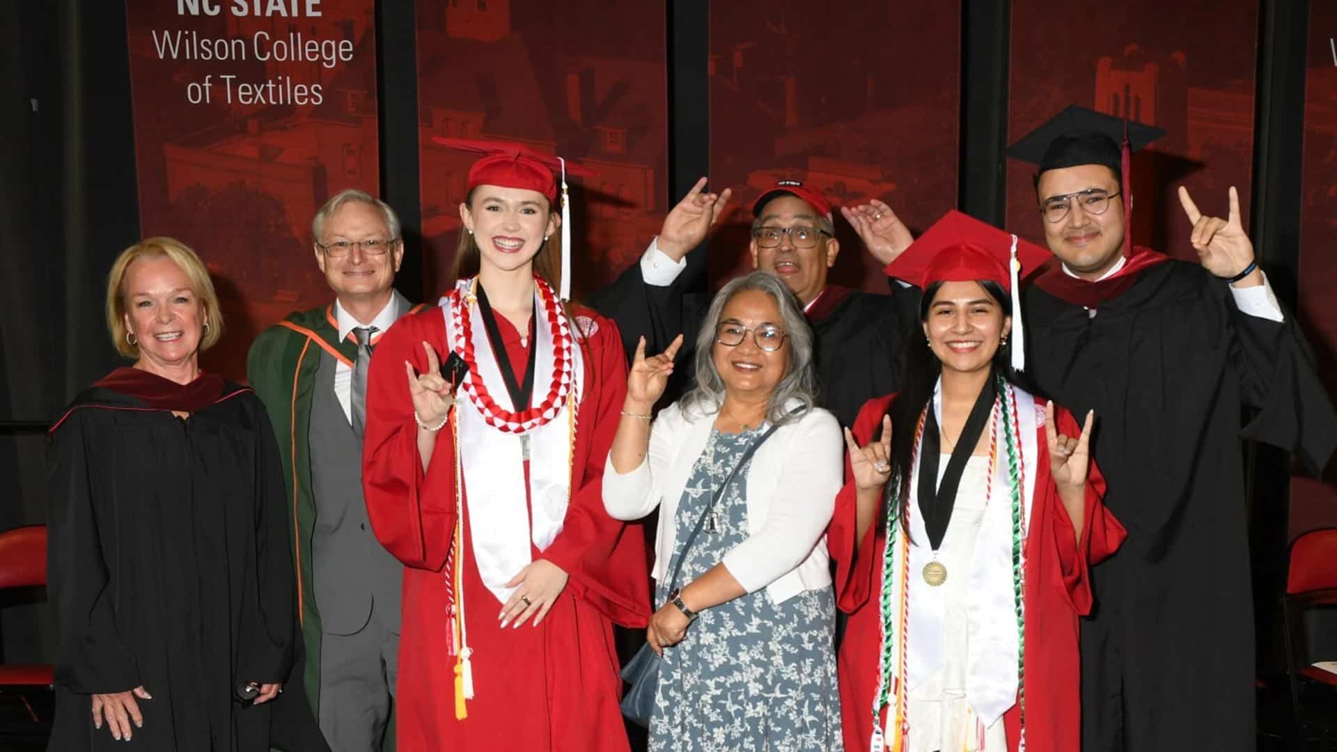 Anil Kochhar and his family pose with recent Wilson College of Textiles graduates.