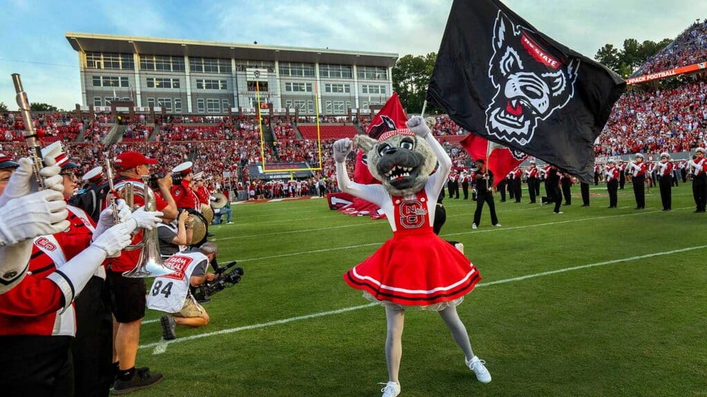 Mrs. Wuf connects with the crowd during the sold out 2025 home opener against ECU.